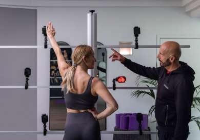 Two people using gym at villa eden retreat .