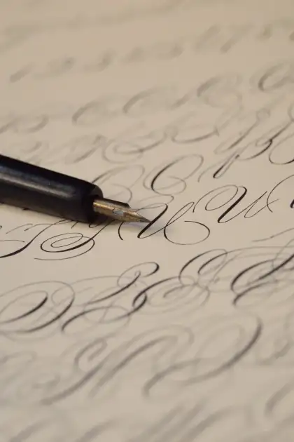 Calligraphy on paper with fountain pen.