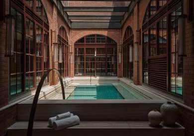 Hotel pool in courtyard.