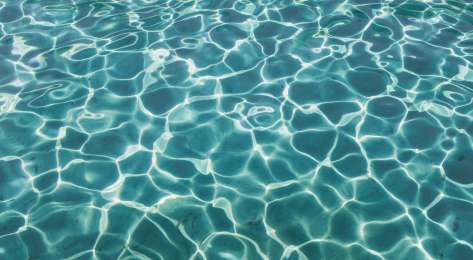 Swimming pool in the sunlight.
