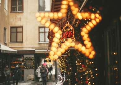 Close-up of christmas lights in city .