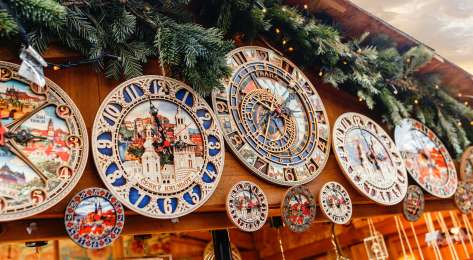 Close-up photo of clocks at christmas market.