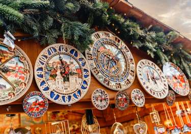 Close-up photo of clocks at christmas market.