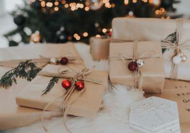 Wrapped presents under christmas tree.