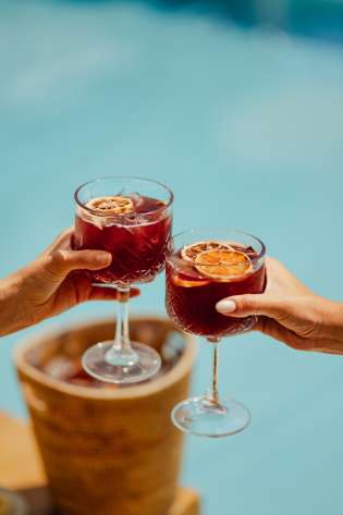 Two glasses of citrus red wine sangria.