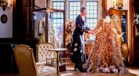 Claire watson armstrong admiring a festive foliage dress.