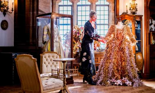 Claire watson armstrong admiring a festive foliage dress.