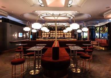 Clays soho interior with red velvet seating.