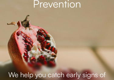 Photo of pomegranate with white text overlay.