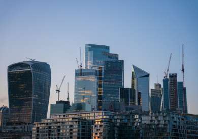 Skyline view of london with the sun setting.