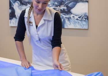 Person getting treatment at villa eden retreat .