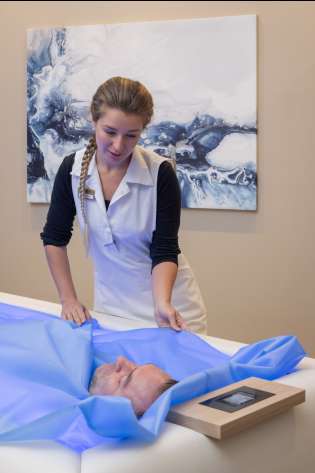 Person getting treatment at villa eden retreat .