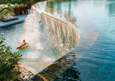Waterfall swimming pool at sri panwa hotel .