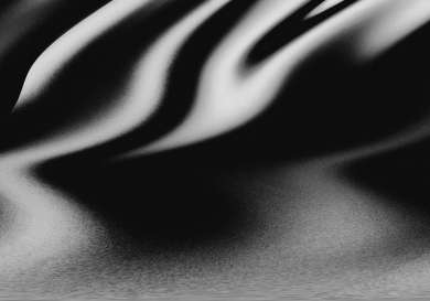 Monochromatic photo of swirling pattern.