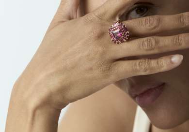 Photo of model wearing pink ring by dinny hall .