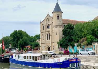 Enchante docked at salleles european waterways.