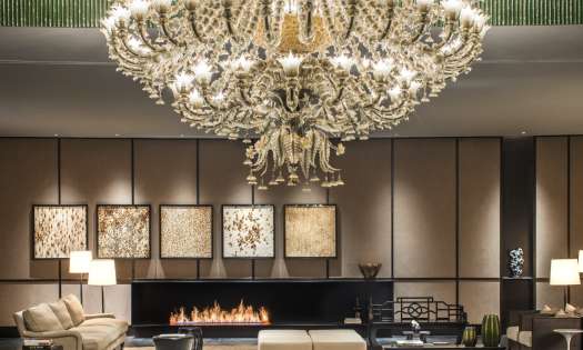 Hotel lobby with giant chandelier.