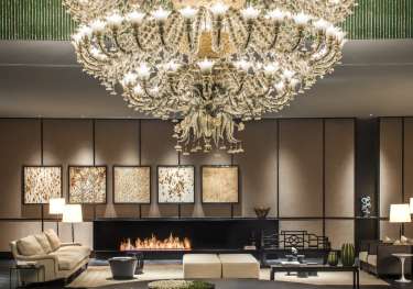 Hotel lobby with giant chandelier.