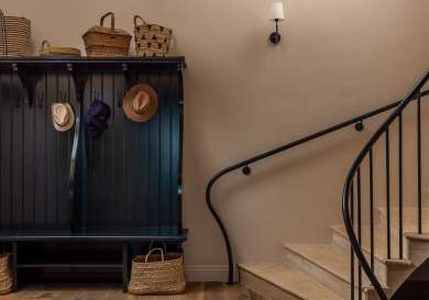 Staircase inside farmhouse hotel.