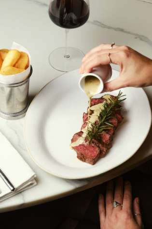 Flat iron steak 190 grams with chunky chips green peppercorn sauce scaled.