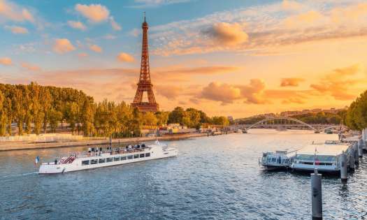 River cruise along the seine with the eiffel tower in the background.