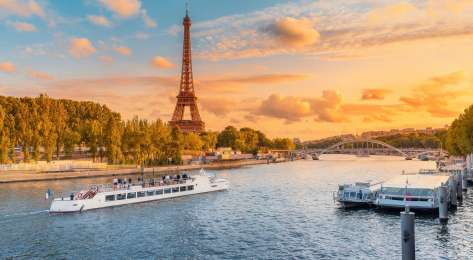 River cruise along the seine with the eiffel tower in the background.