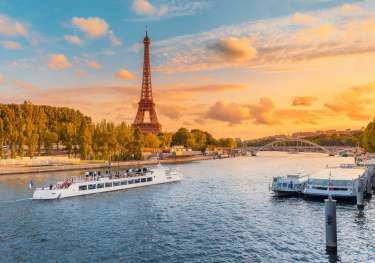 River cruise along the seine with the eiffel tower in the background.