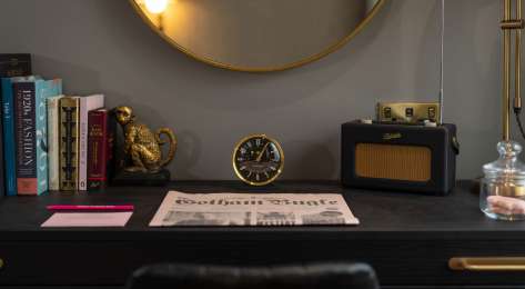 Desk in room at hotel gotham.