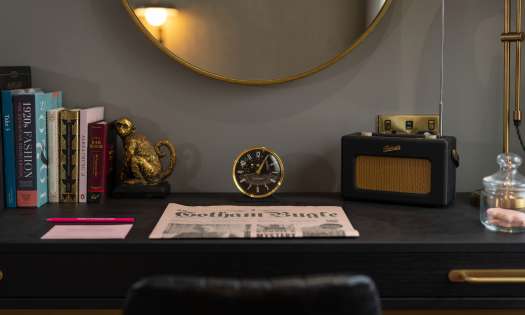 Desk in room at hotel gotham.