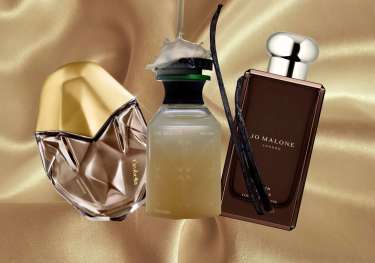 Trio of fragrances on silk background.