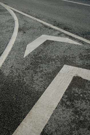Grey and white road markings.