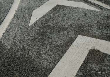 Grey and white road markings.