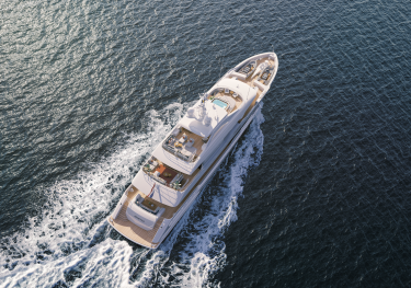 Aerial view of yacht sailing across sea .
