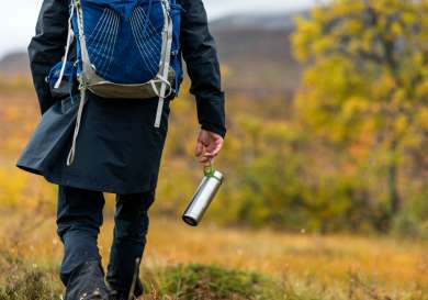 Person walking outside in swedish countryside.