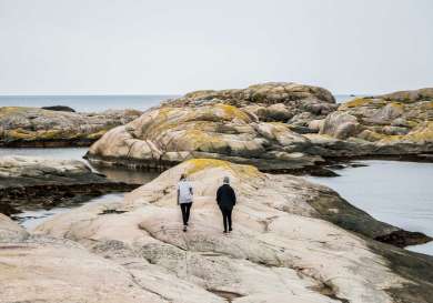 Two people walking in sweden.