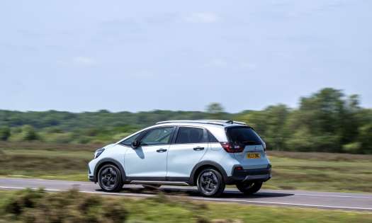 Honda jazz car road.