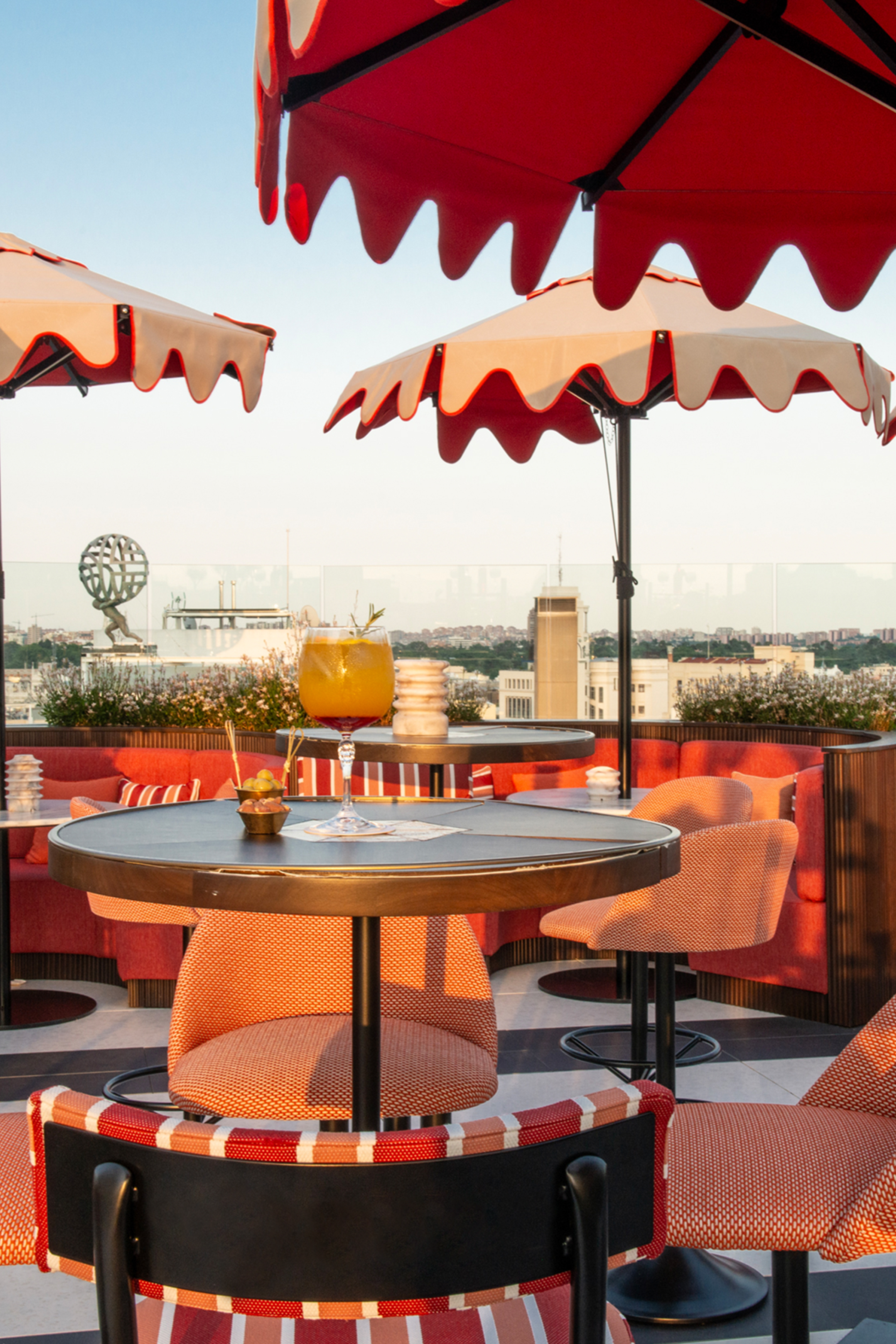 madrid rooftop with red umbrellas