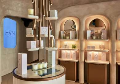 Room inside beauty clinic with wall of products .