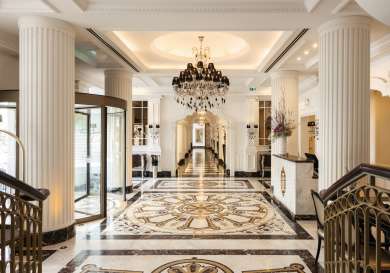 Hotel lobby with marble flooring.