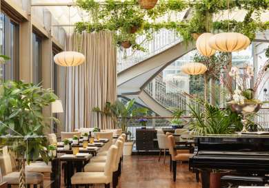 Hotel restaurant area with piano.