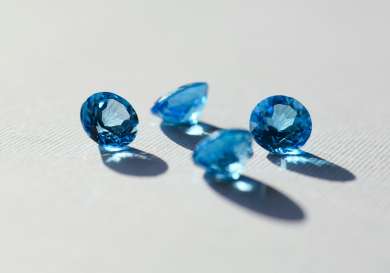 Four blue gem stones .