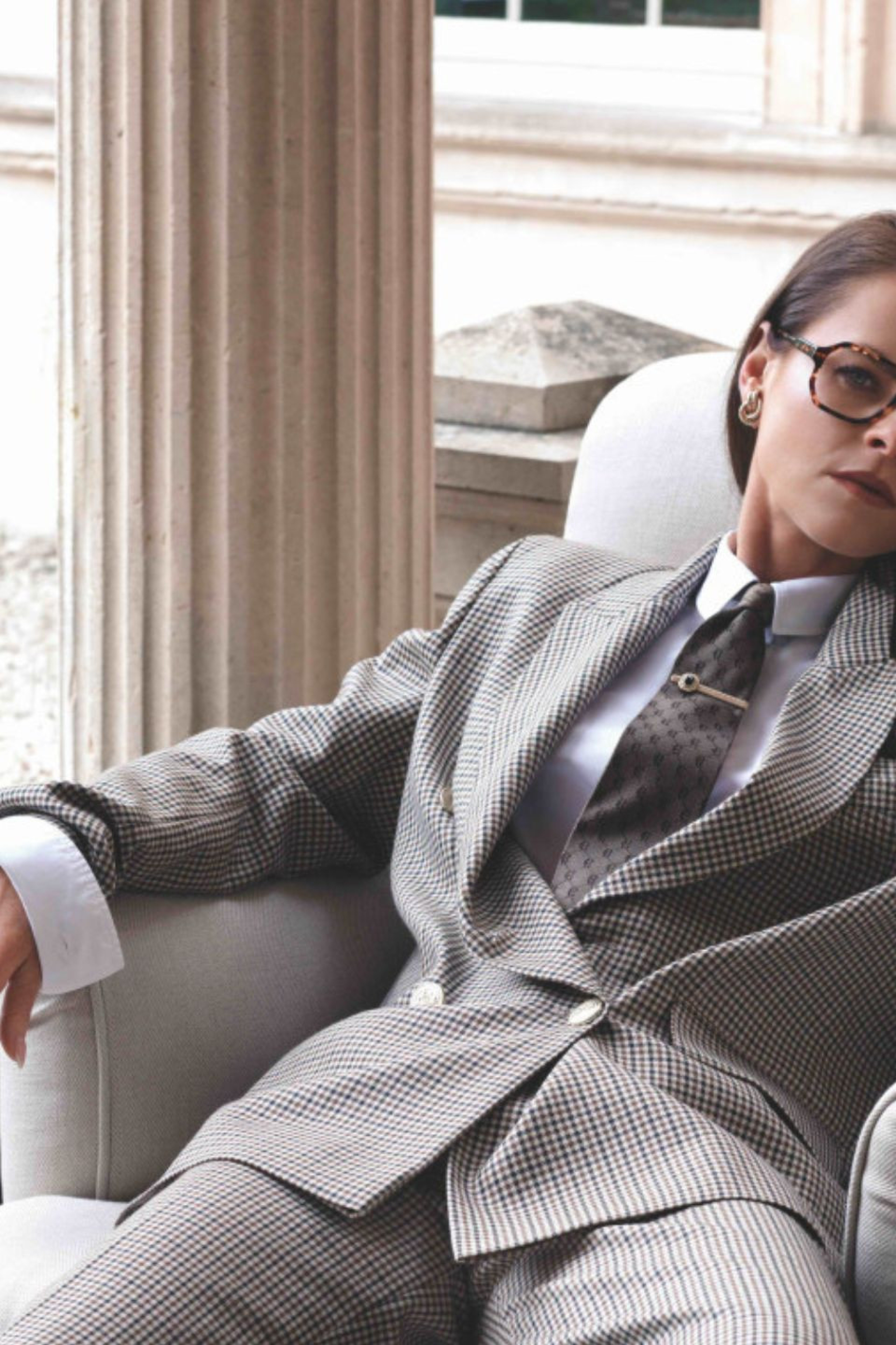 portrait of jade holland cooper sat in chair next to dog