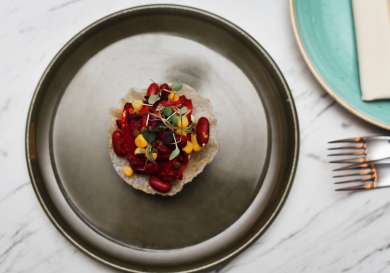 Dish served on round plate in restaurant .