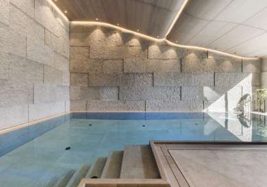 Swimming pool inside chalet spa .