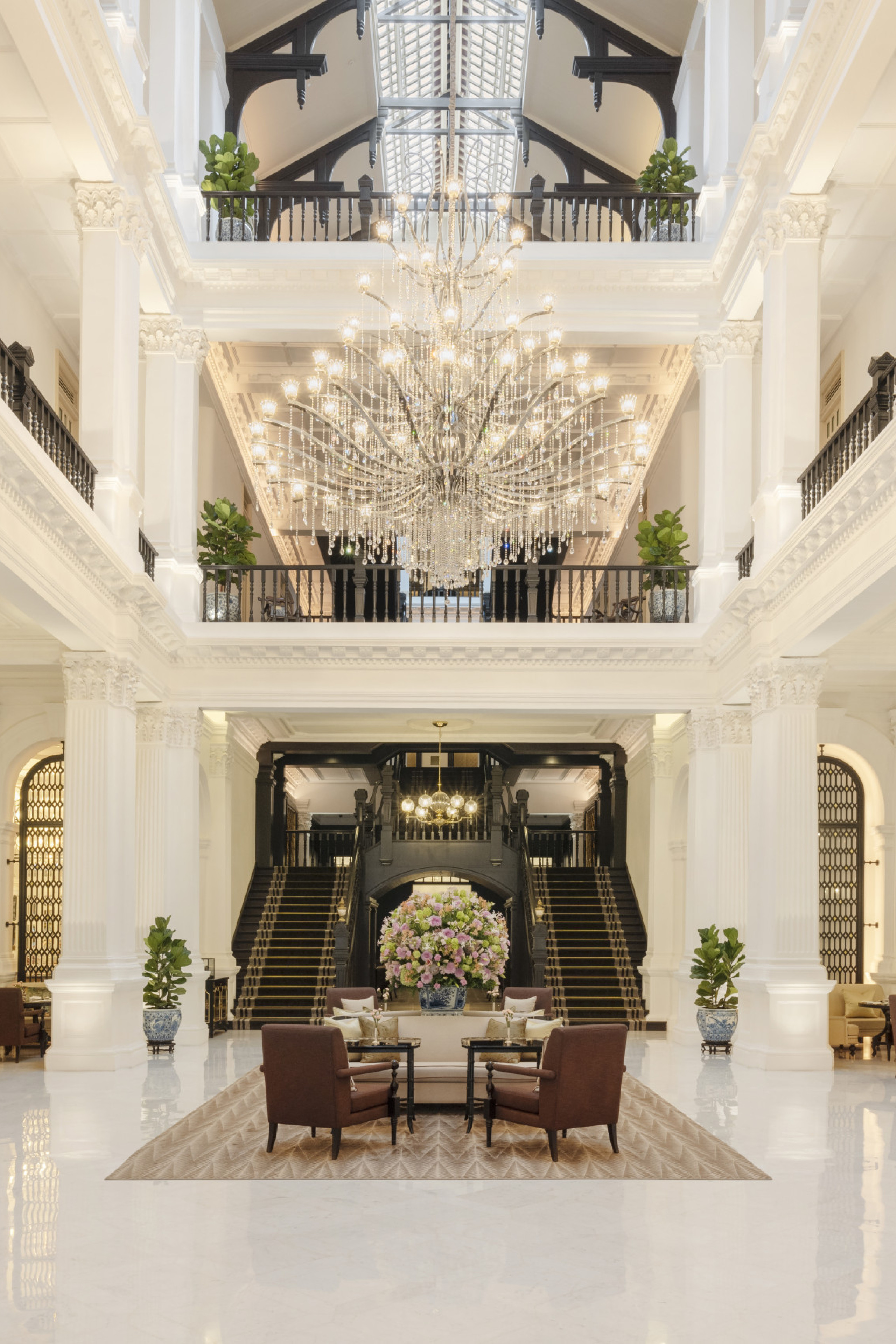 lobby of hotel with chandelier