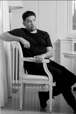 Black and white headshot of luke selby .