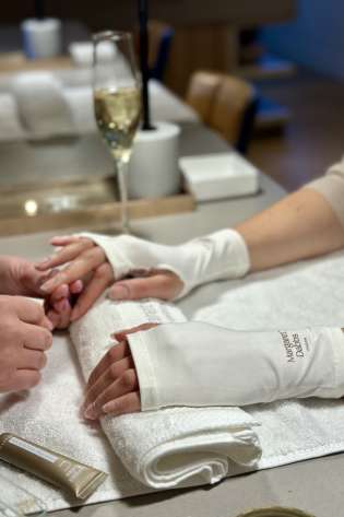 Photo of person getting a manicure.