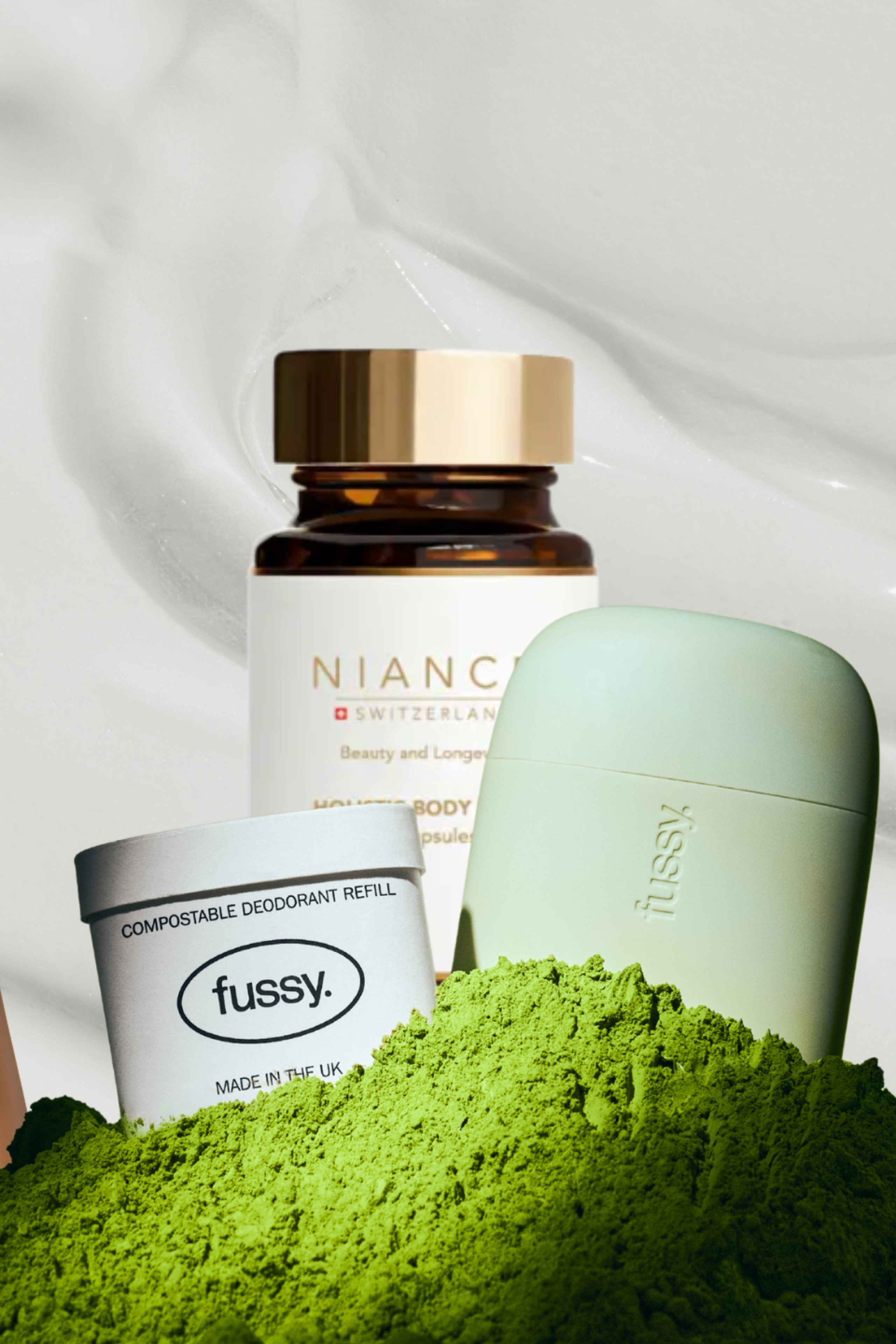 array of beauty and wellness products on white cream background