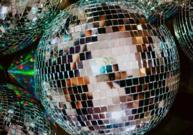 Array of mirror disco balls .