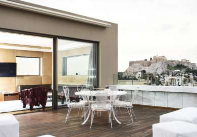 Hotel penthouse suite with rooftop area .